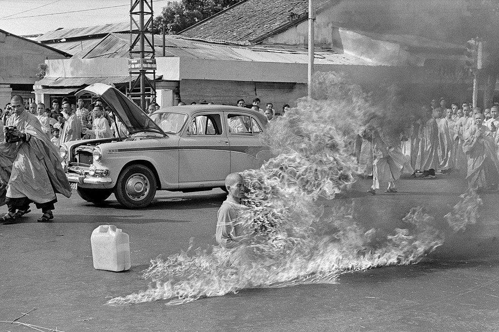 A Buddhist monk self-immolates in protest of the Diem government's policies